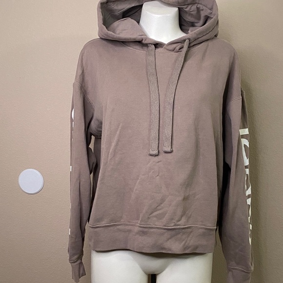 Calvin Klein Jeans tan logo graphic statement hoodie 🖤🖤M - Picture 2 of 11